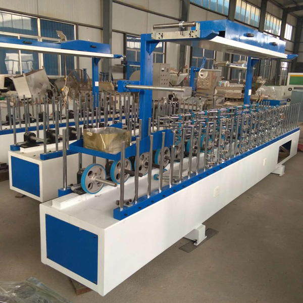 萬能包覆機(jī)3.jpg 萬能包覆機(jī)3.jpg